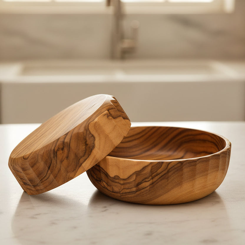Wooden bowl with lid on a white background