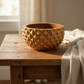 Wooden pineapple-shaped planter on a white background