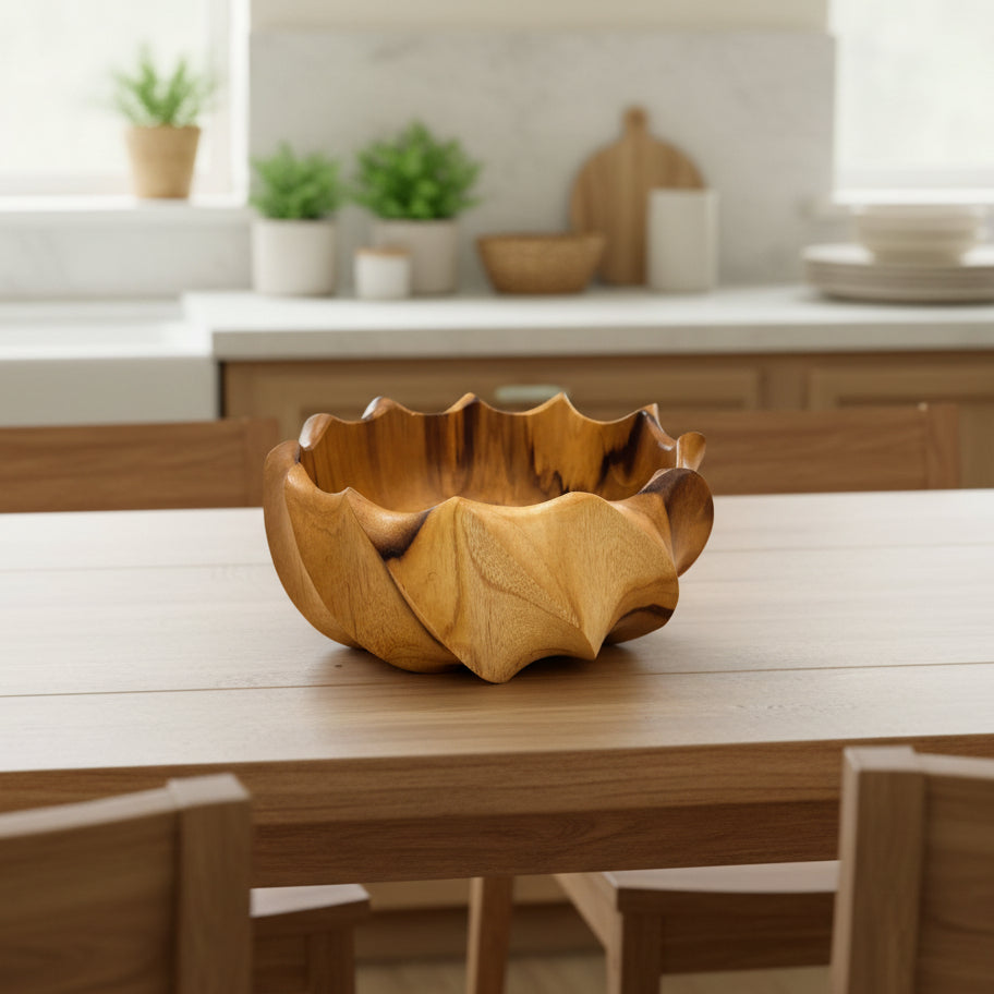 Wooden bowl with wavy edge on a white background